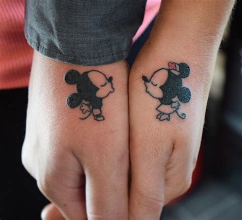 Mickey Mouse And Minnie Mouse Kissing Tattoo