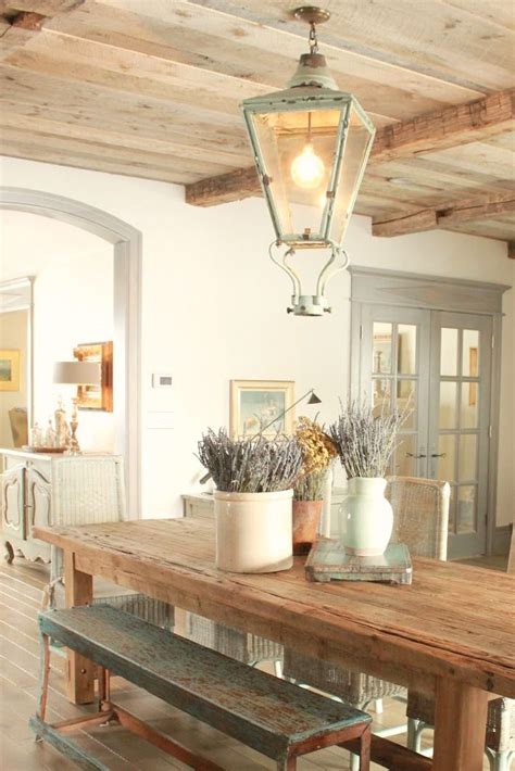 It reminds us of times gone by, of palaces and cottages that time has forgotten, of designs and patterns that were loved many moons ago. French Country decor in dining room with rustic farm table ...