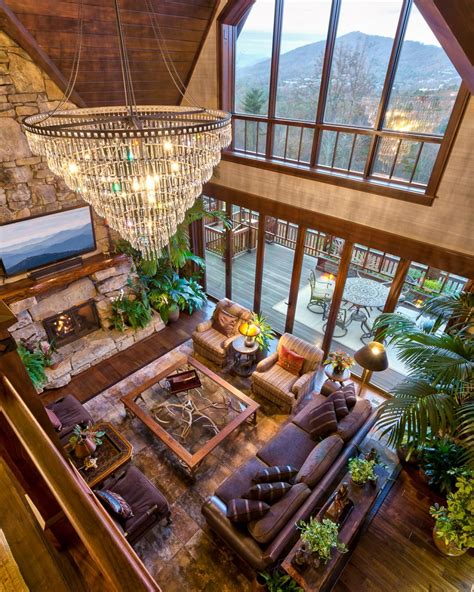 Rustic Living Room With Crystal Chandelier And Vaulted Ceiling Living