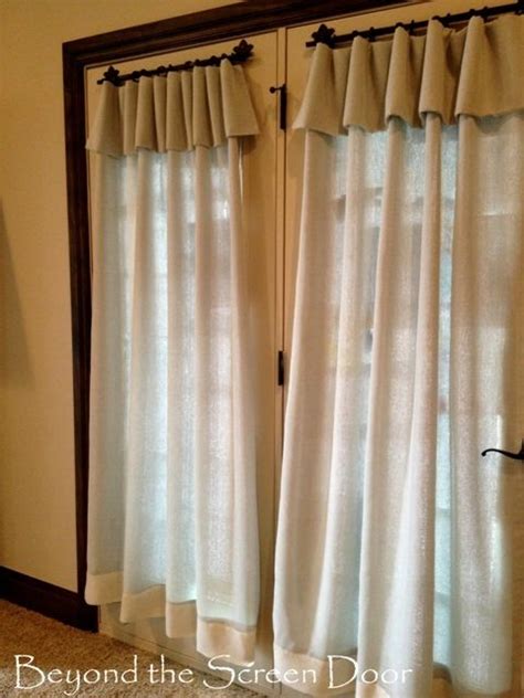 On windows, drapery panels hang from rings. Aqua and Cream French Door Window Treatments | French door ...
