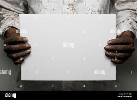 Man Holding Blank Cardboard Stock Photo Alamy
