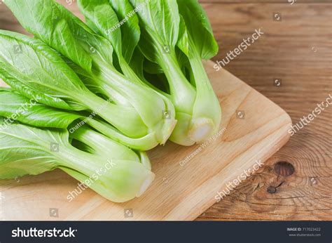 Fresh Chinese Cabbage Or Bok Choy Vegetable On Wooden