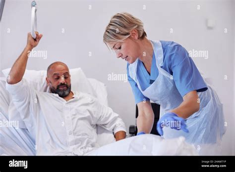 Nurse Taking Care Of Patient In Hospital Stock Photo Alamy