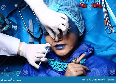 Creative Plastic Surgery On Blue Tone Fashion Patient Female Mod Stock