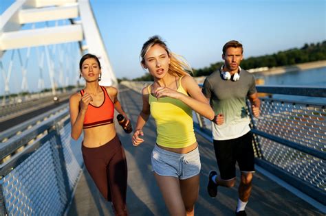 Fitness Sport People And Running Concept Happy Fit Friends Running