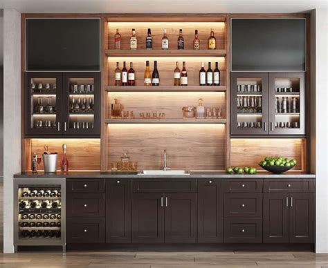 A Modern Home Bar With Lots Of Bottles And Glasses On The Shelves As Well As An Open Wine Rack