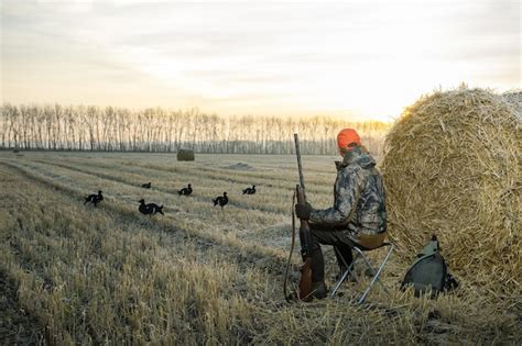Premium Photo Hunter Man Hunting Period Autumn Season Male With A Gun