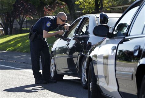 The Real Reason Officers Tap Your Tail Light At A Traffic Stop