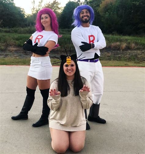 Three People Dressed In Costumes Posing For A Photo With One Woman
