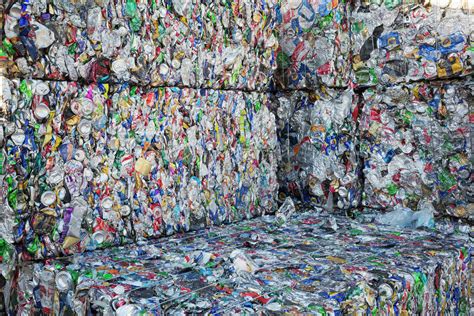Compressed bundles of plastic bottles at a recycling centre. - Stock ...