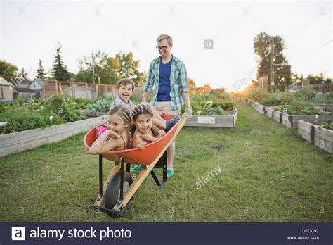 Kids Pushing Wheelbarrow Hi Res Stock Photography And Images Alamy