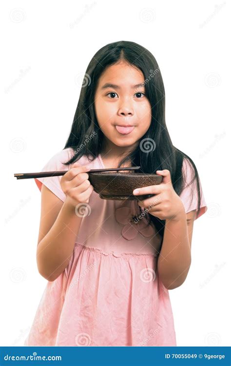 Portrait Of Asian Cute Girl Eating Using Chopsticks Isolated On White Stock Image Image Of