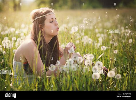 Beautiful Hippie Woman Blowing Dandelion Flowers Nature Harmony Stock