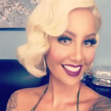 Amber Rose Shamelessly Professes Love Of “big D” As She Flaunts Her Cleavage In Marilyn