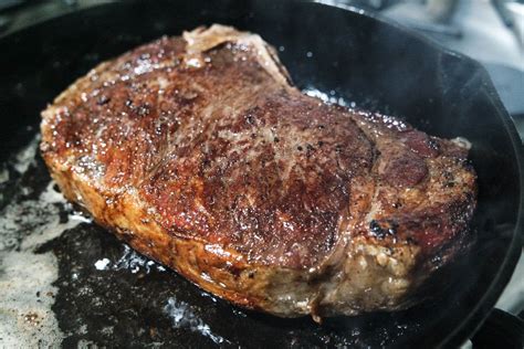 Place the steak into the skillet and cook until it's easily moved. how to cook a delmonico steak in a cast iron skillet