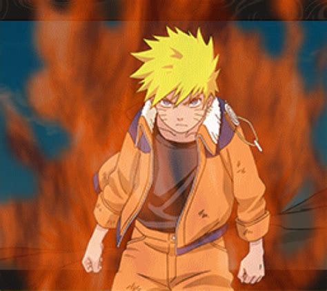 A Man With Yellow Hair And Orange Pants Standing In Front Of A Red Fire
