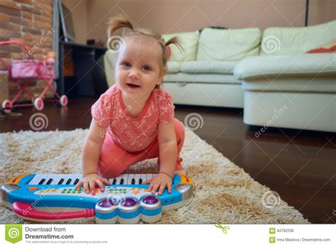 Cute Baby Playing With Toy Piano Stock Photo Image Of