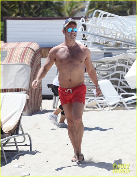 Shirtless Andy Cohen Takes A Splash In Miami Beach Photo