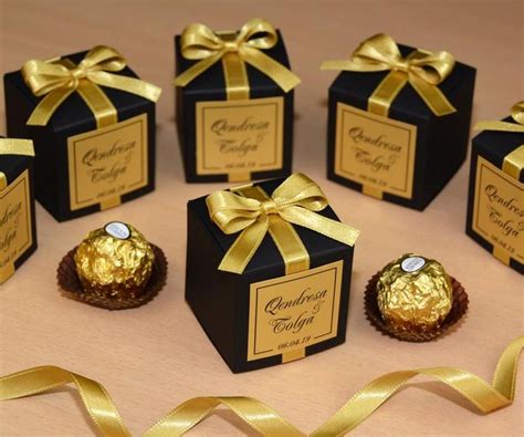 The online world is the best cradle for all the wedding accessories you wish for. Black & Gold wedding favor boxes for guests. Elegant Wedding bonbonniere. Personalized Candy box ...