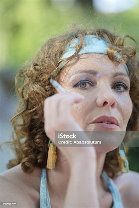 Beautiful Mature Woman Smoking Europe Stock Photo Download Image Now