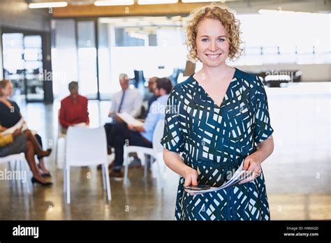Portrait Smiling Businesswoman In Office Stock Photo Alamy