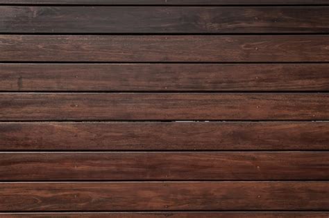 Premium Photo | Dark brown wood background, wood planks.