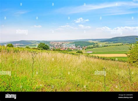 Rural German Landscape With Meadow In Foreground And Blue Sky Stock