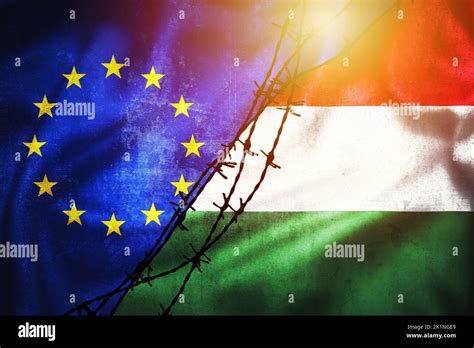 Grunge Flags Of Eu And Hungary Divided By Barb Wire Illustration Sun