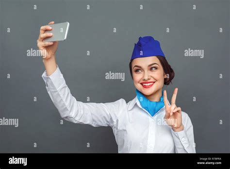 Professional Occupation Stewardess Standing Isolated On Grey Taking