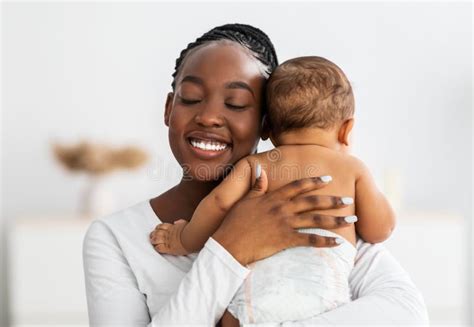 African American Mom Hugging Her Cute Infant Stock Photo Image Of