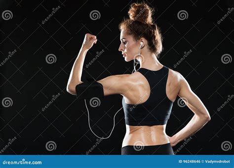 Back View Of A Fitness Woman Showing Her Bicep Stock Photo Image Of