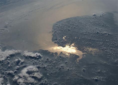 The buildings are evenly spaced and. Sun Glint on the Gulf of Khambhat - SpaceRef