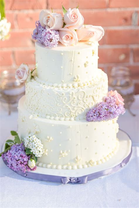 Classic White Wedding Cake With Fresh Lilac
