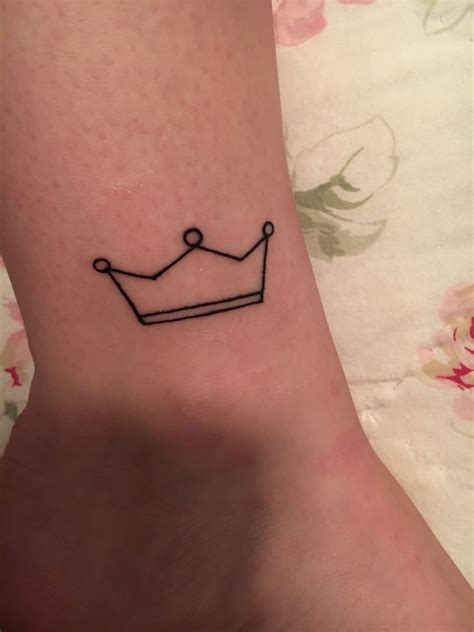 Crown tattoos men choose are usually more rugged, simple and angular than this one. simple crown tattoo | Crown tattoo, Simple crown tattoo ...