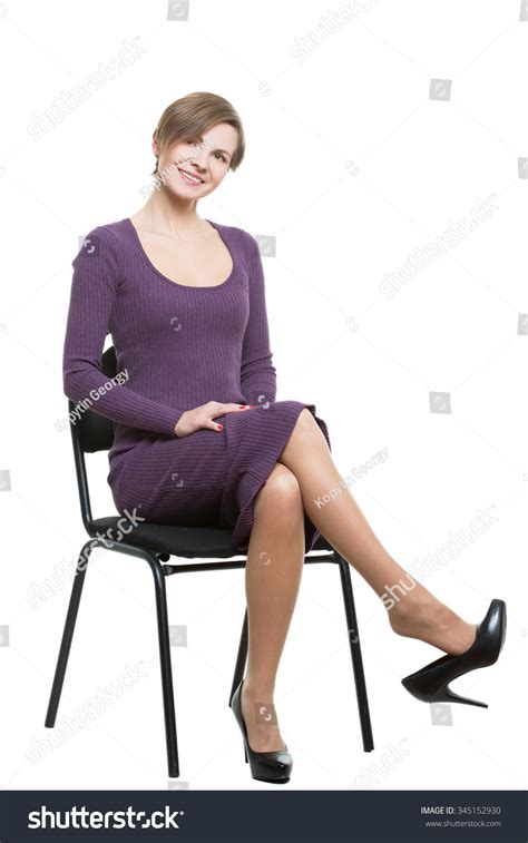 Woman Sits A Chair Pose Showing Sexual Desire Royalty Free Stock