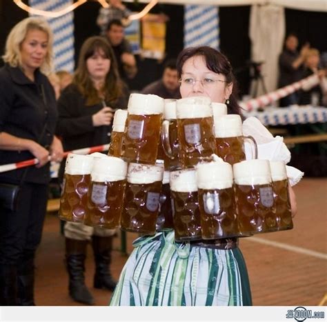 Oktoberfest Waitress Serves Mugs Of Beer Oktoberfest Beer Festival