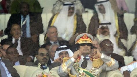 Gaddafi Buried At Dawn