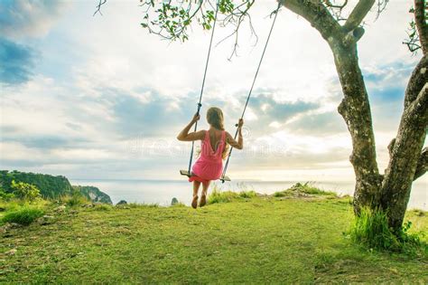 Woman Swinging On A Swing On A Tropical Island Stock Image Image Of
