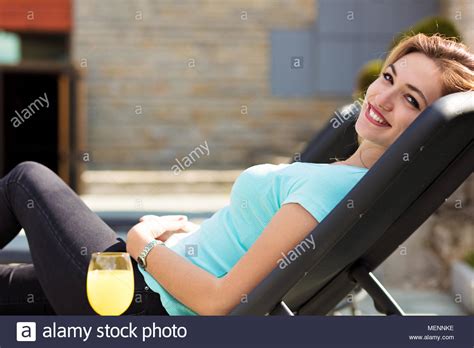 Woman Relaxing In Lawn Chair Hi Res Stock Photography And Images Alamy