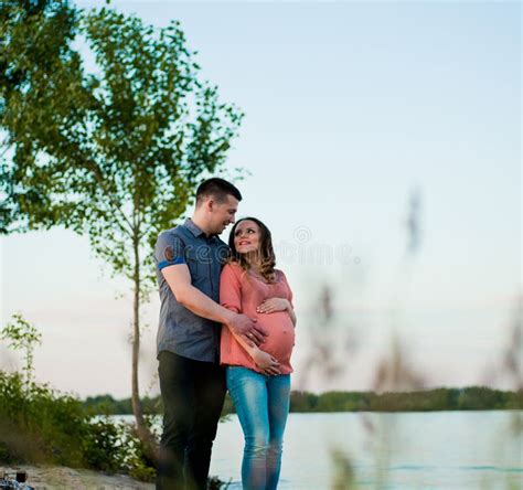 Happy Pregnant Woman Outdoors Stock Photo Image Of Embracing Fondle