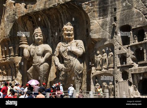 Carved Buddha Images At Longmen Caves Dragon Gate Grottoes Unesco World