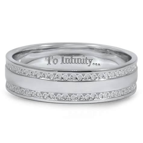 This band, pictured at 4mm, was designed to rest comfortably on the finger while adding a touch of visual. Popular Wedding Ring Engraving Ideas:
