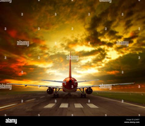 Air Plane Taking Off From Airport Runway Stock Photo Alamy