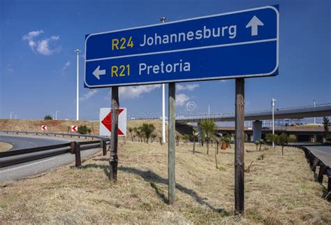 Road Signs Indicating The Direction Of Travel To Pretoria And