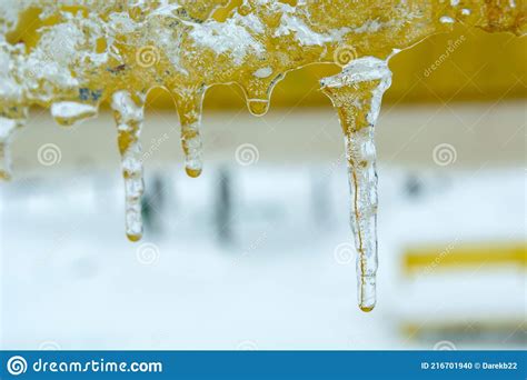 Melting Hanging Icicles And Water Drops Winter View Stock Photo