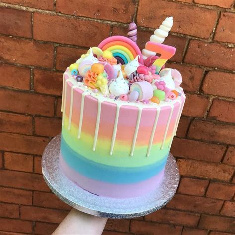 Birthday cake for my 7 year old gum paste seahorses shells. Three Bears Bakery on Instagram: "A super colourful rainbow and unicorn themed cake for a lucky ...