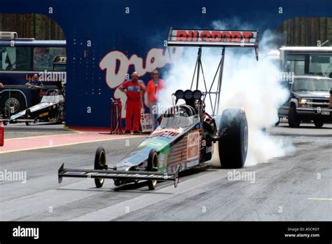 Top Fuel Dragster Warming Up Its Tires To Increase Grip Before A Drag