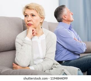 Sad Middleaged Couple Quarreling Home Each Stock Photo Shutterstock