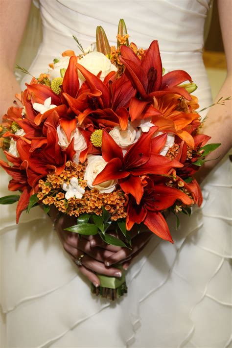 Brides Fall Bouquet Burnt Orange Lilies And Ivory Roses Orange