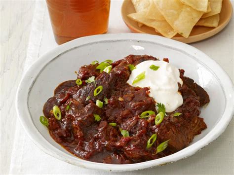 Add paprika, chili powder, cumin, oregano, and stewed tomatoes (including liquid), beer condiments: Slow-Cooker Texas Chili Recipe | Food Network Kitchen ...